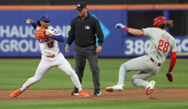 Phillies' Alec Bohm (right) slides to second base during the second inning of a 6-0 loss to the Mets on Wednesday.