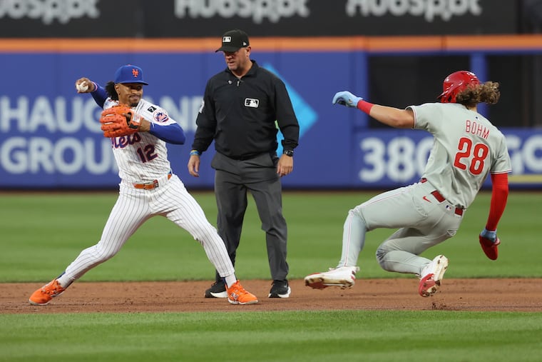 Phillies' Alec Bohm (right) slides to second base during the second inning of a 6-0 loss to the Mets on Wednesday.
