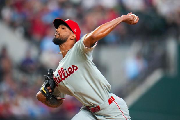Philadelphia Phillies pitcher Cristopher Sánchez throws a pitch to the Texas Rangers during the first inning of a baseball game Friday, Aug. 8, 2025, in Arlington, Texas. (AP Photo/Julio Cortez)