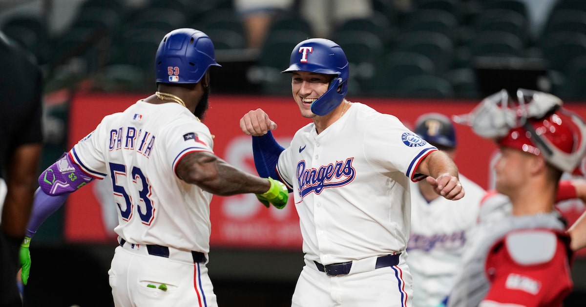 Texas Rangers finally loosen up, unleash record-setting offensive outburst on Angels