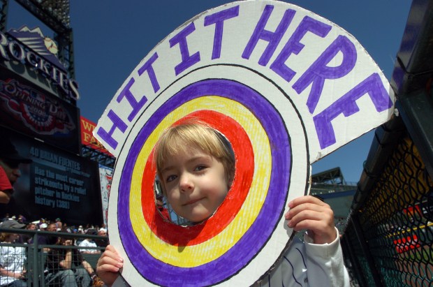 Emily Sauvageau, 4, of Denver shows up with a sign for the Colorado Rockies' home opener against the Arizona Diamondbacks at Coors Field in 2007. This was her 153rd Rockies game. (Photo by Hyoung Chang/The Denver Post)
