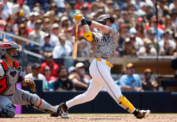 Jake Cronenworth #9 of the San Diego Padres hits a two-run home run in the fourth inning against the St. Louis Cardinals at Petco Park on Aug. 3, 2025 in San Diego, California. (K.C. Alfred / The San Diego Union-Tribune)