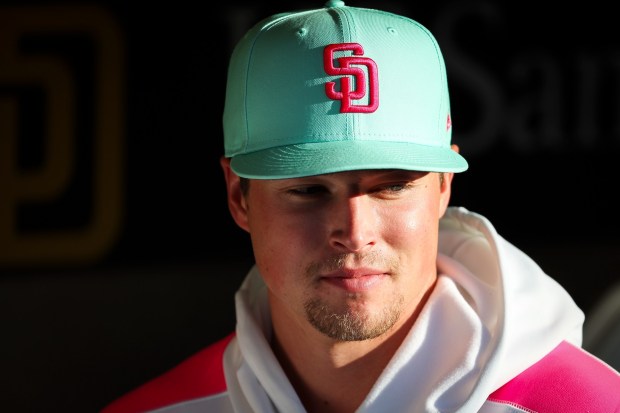 Mason Miller #22 of the San Diego Padres looks on in the dugout before their game against the St. Louis Cardinals at Petco Park on Friday, Aug. 1, 2025 in San Diego, CA. (Meg McLaughlin / The San Diego Union-Tribune via Getty Images)