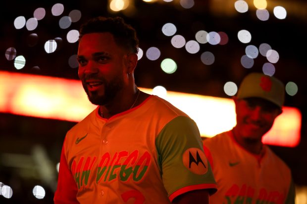 Xander Bogaerts #2 of the San Diego Padres and Manny Machado #13 look on before the ninth inning against the St. Louis Cardinals at Petco Park on Friday, Aug. 1, 2025 in San Diego, CA. (Meg McLaughlin / The San Diego Union-Tribune)