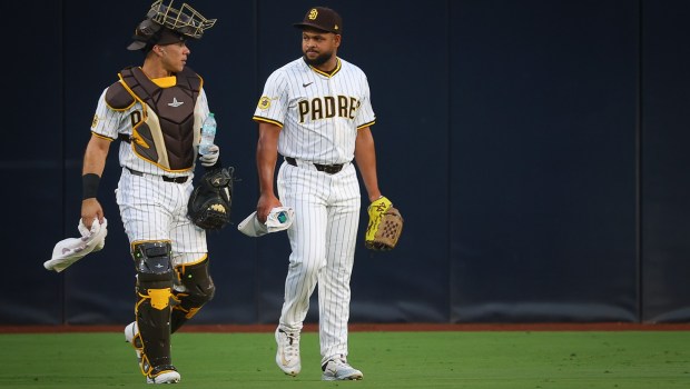 Freddy Fermin #54 and Randy Vasquez #98 of the San Diego Padres walk to the dugout before their game against the St. Louis Cardinals at Petco Park on Saturday, Aug. 2, 2025 in San Diego, CA. (Meg McLaughlin / The San Diego Union-Tribune)