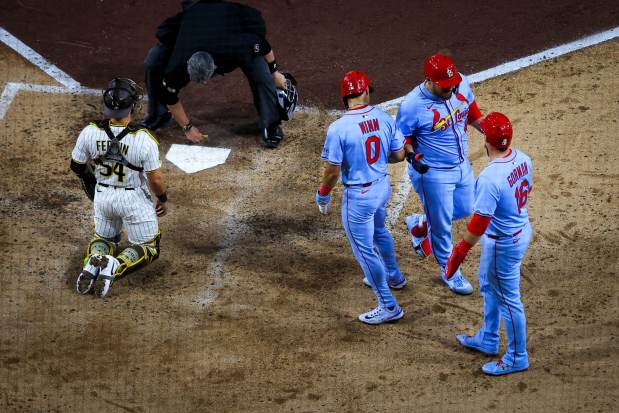 Masyn Winn #0, Pedro Pages #43 and Nolan Gorman #16 of the St. Louis Cardinals celebrate after Pages' home run against the San Diego Padres during the fourth inning at Petco Park on Saturday, Aug. 2, 2025 in San Diego, CA. (Meg McLaughlin / The San Diego Union-Tribune)