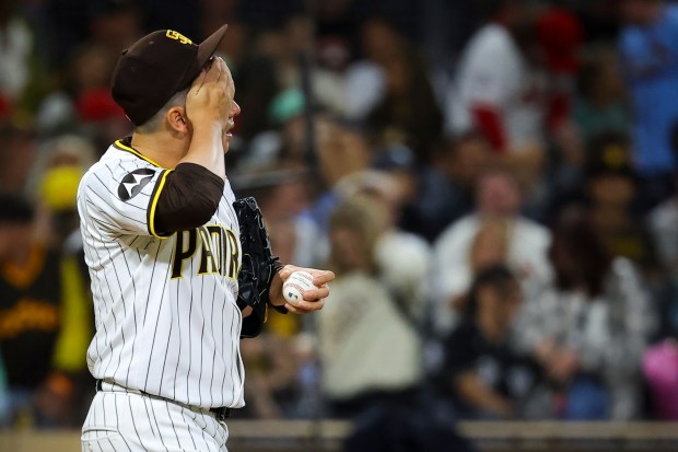 Yuki Matsui #1 of the San Diego Padres wipes his face during the ninth inning against the St. Louis Cardinals at Petco Park on Saturday, Aug. 2, 2025 in San Diego, CA. (Meg McLaughlin / The San Diego Union-Tribune)