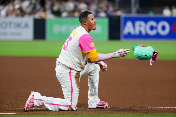 Manny Machado #13 of the San Diego Padres tosses his helmet after grounding out against the Los Angeles Dodgers during the eighth inning at Petco Park on Friday, Aug. 22, 2025 in San Diego, CA. (Meg McLaughlin / The San Diego Union-Tribune)
