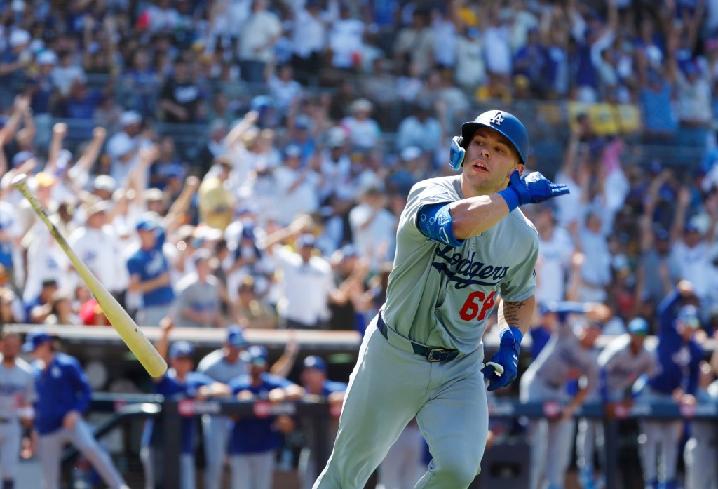 Dodgers pound Padres to move back into tie atop NL West