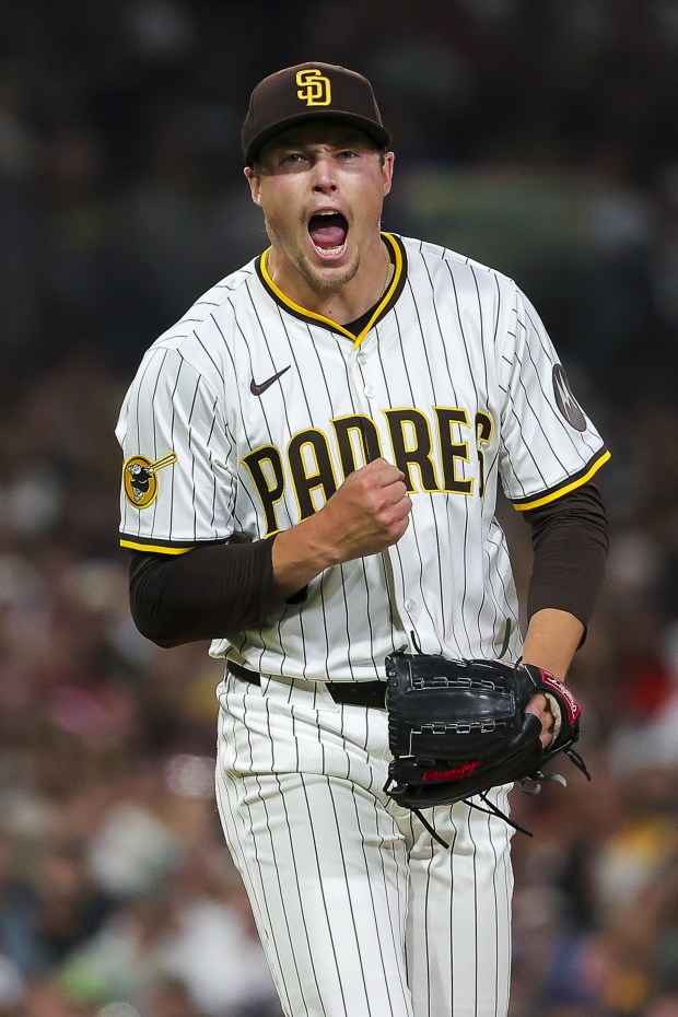 Mason Miller #22 of the San Diego Padres reacts after striking out Wilyer Abreu #52 of the Boston Red Sox during the eighth inning at Petco Park on Saturday, Aug. 9, 2025 in San Diego, CA. (Meg McLaughlin / The San Diego Union-Tribune)