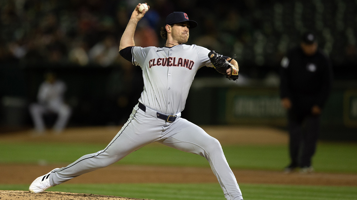 Cleveland Guardians starting pitcher Shane Bieber (57) delivers a pitch against the Oakland Athletics during the third inning at Oakland-Alameda County Coliseum.