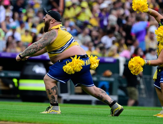 A member of the Savannah Bananas Dad Bod Cheer Squad before the game against The Firefighter at Coors Field in Denver, on Saturday, Aug. 09, 2025. (Photo by Andy Cross/The Denver Post)