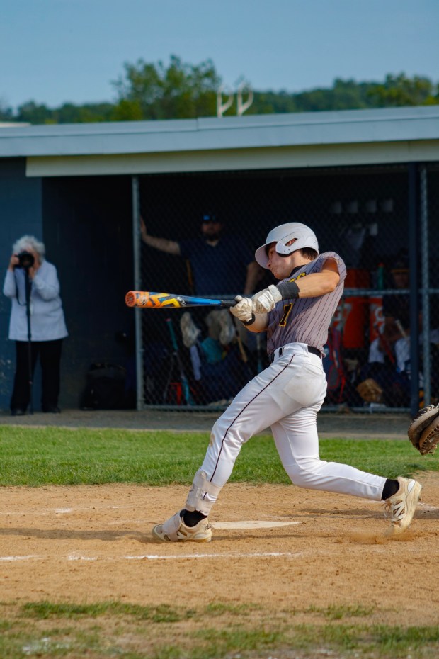 Northwestern Lehigh player misses a pitch against the Panthers in the first round of the Pennsylvania Interscholastic Athletic Association, Inc. Championships. (Oliver Lois Economidis/The Morning Call)