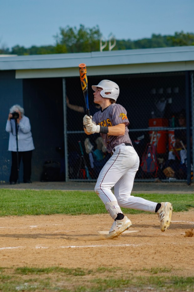 Northwestern Lehigh pitcher and shortstop Cole Dynda on Monday, June 2, 2025, at Northwestern Lehigh High School in New Tripoli watches his hit. (Oliver Lois Economidis/The Morning Call) 