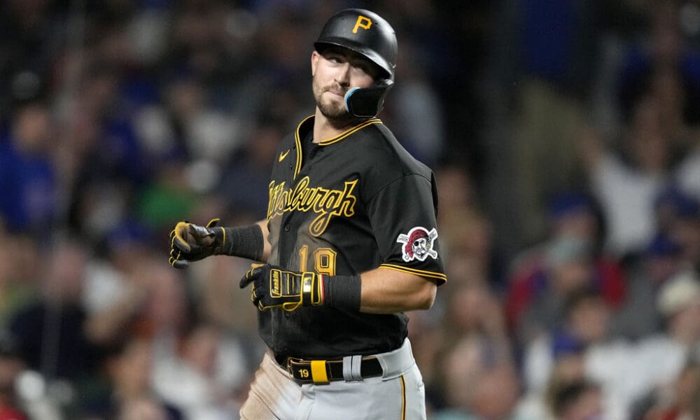 Pittsburgh Pirates' Jared Triolo scores during a baseball game against the Chicago Cubs Thursday, Sept. 21, 2023, in Chicago. (AP Photo/Charles Rex Arbogast)