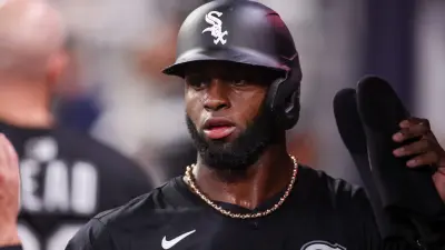 Aug 18, 2025; Atlanta, Georgia, USA; Chicago White Sox center fielder Luis Robert Jr. (88) celebrates with teammates after scoring a run against the Atlanta Braves in the eighth inning at Truist Park.