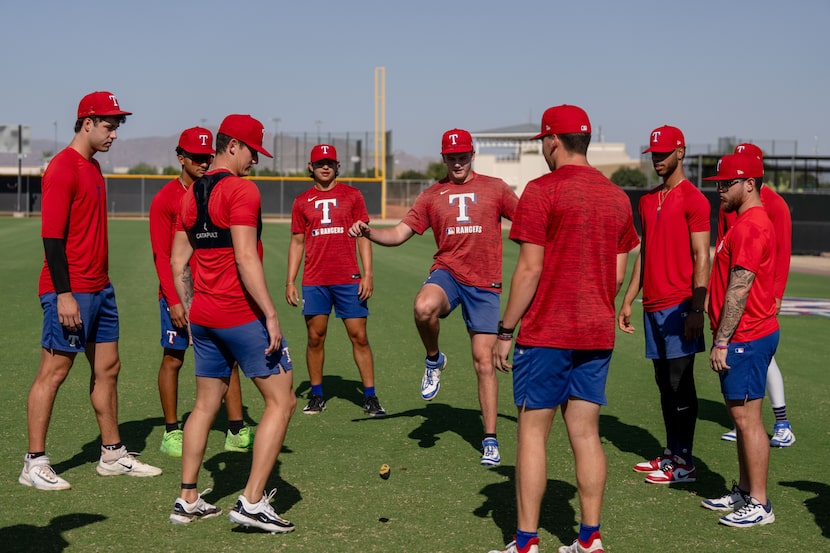 Texas Rangers play hacky sack at the practice facility in Surprise, Arizona Friday August 8,...