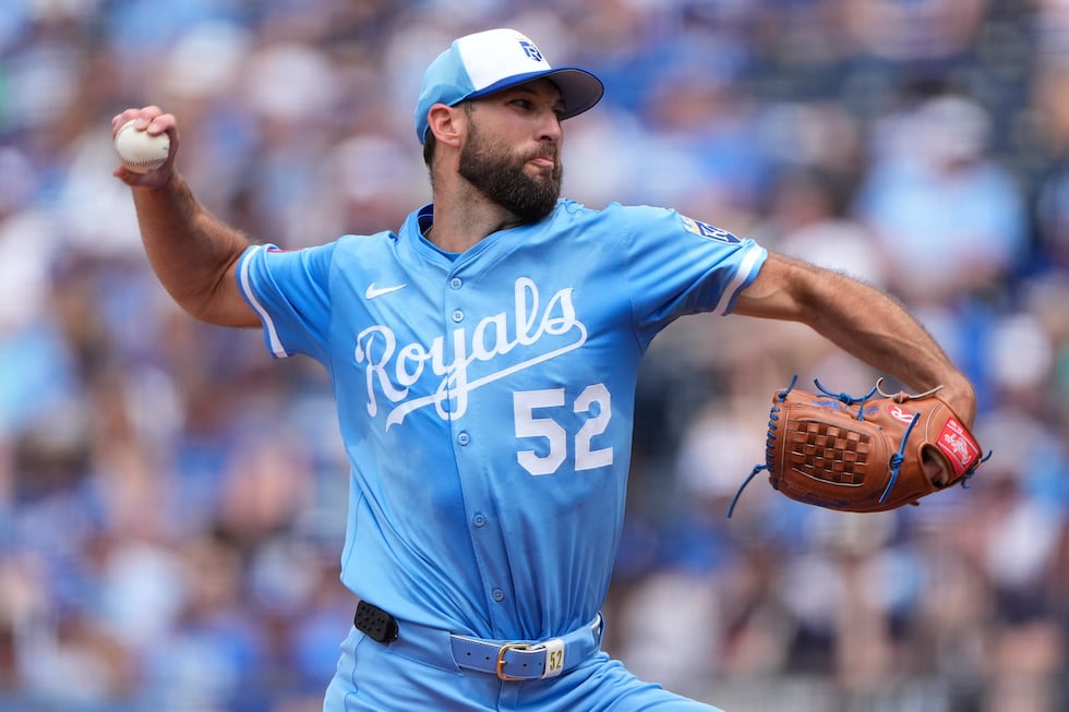 Kansas City Royals starting pitcher Michael Wacha throws during the first inning of a baseball...