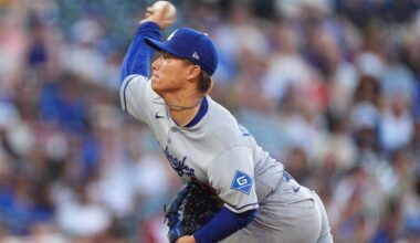 Los Angeles Dodgers starting pitcher Yoshinobu Yamamoto works against the Colorado Rockies in the first inning of a baseball game, Monday, Aug. 18, 2025, in Denver. (AP Photo/David Zalubowski)