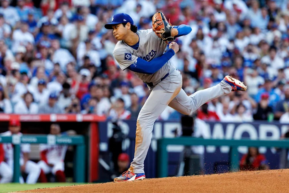 Dodgers pitcher Shohei Ohtani delivers the ball from the mound against the Angles on Wednesday at Angel Stadium.