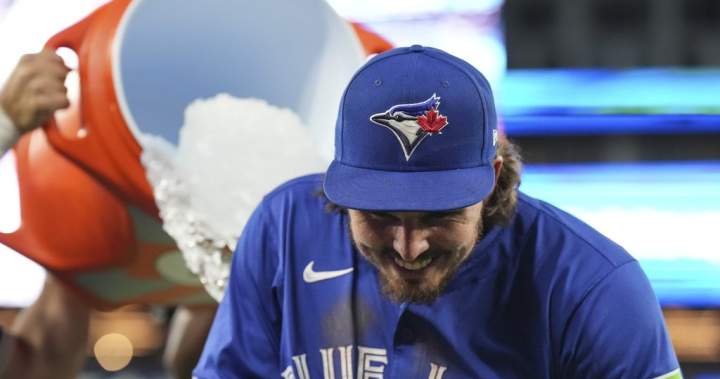 Barger keys late rally as Jays top Twins 9-8