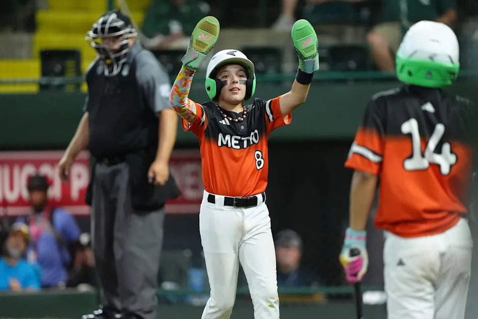 Aug 18, 2025; Williamsport, PA, USA; Joe Sorrentino (8) of Metro Region reacts after scoring a run against Midwest Region in the sixth inning at Howard J Lamade Stadium.