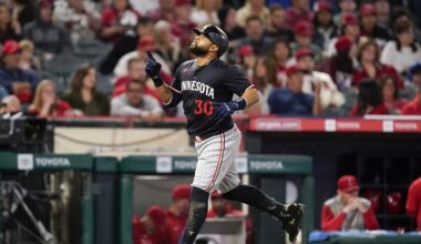 Minnesota Twins' Carlos Santana gestures while running the bases after hitting a three-run home run against the Los Angeles Angels during the fourth inning of a baseball game Saturday, April 27, 2024, in Anaheim, Calif. (AP Photo/Ryan Sun)