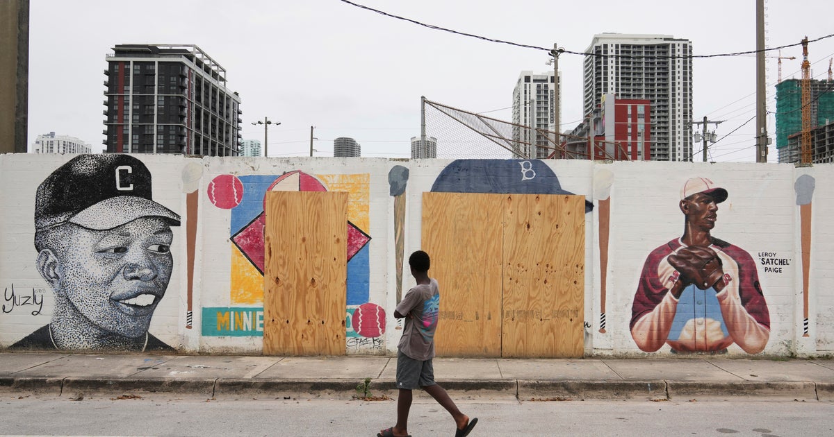 Miami Marlins join efforts to restore defaced Jackie Robinson and Minnie Miñoso mural in Overtown