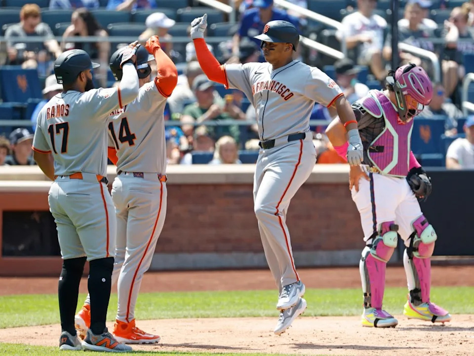 Rafael Devers #16 of the San Francisco Giants celebrates with Patrick Bailey #14 of the San Francisco Giants after he scores on his three-run home run during the third inning. Jason Szenes / New York Post