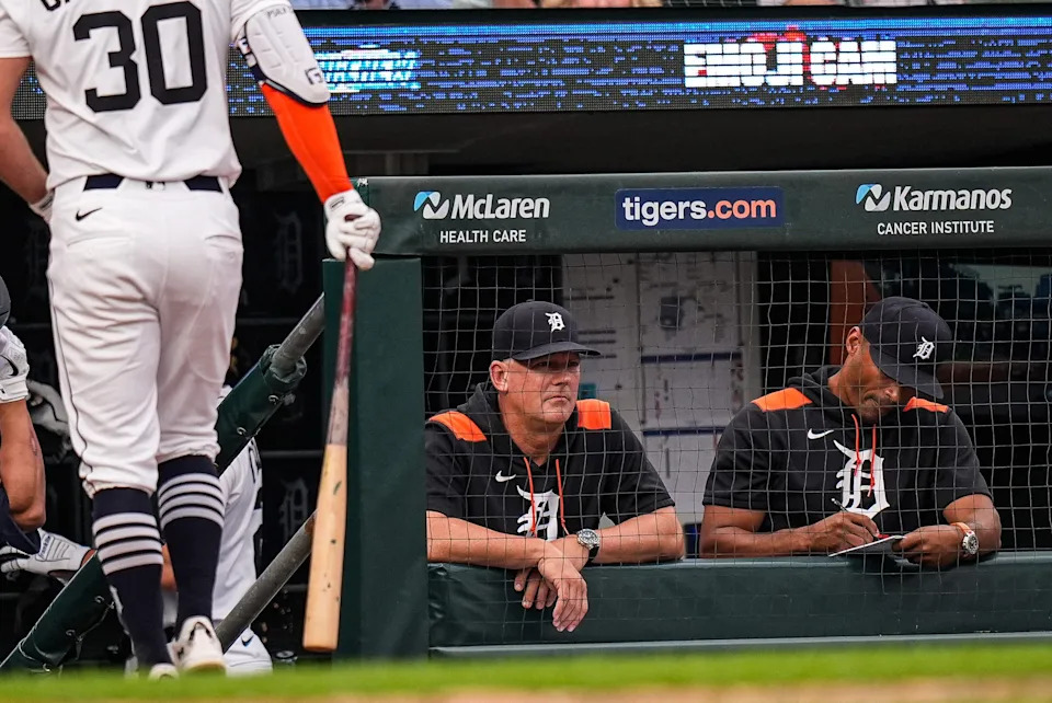 Detroit Tigers manager A.J. Hinch (14), center, next to bench coach George Lombard (26) watch a play against Minnesota Twins during the fourth inning at Comerica Park in Detroit in Monday, August 4, 2025.
