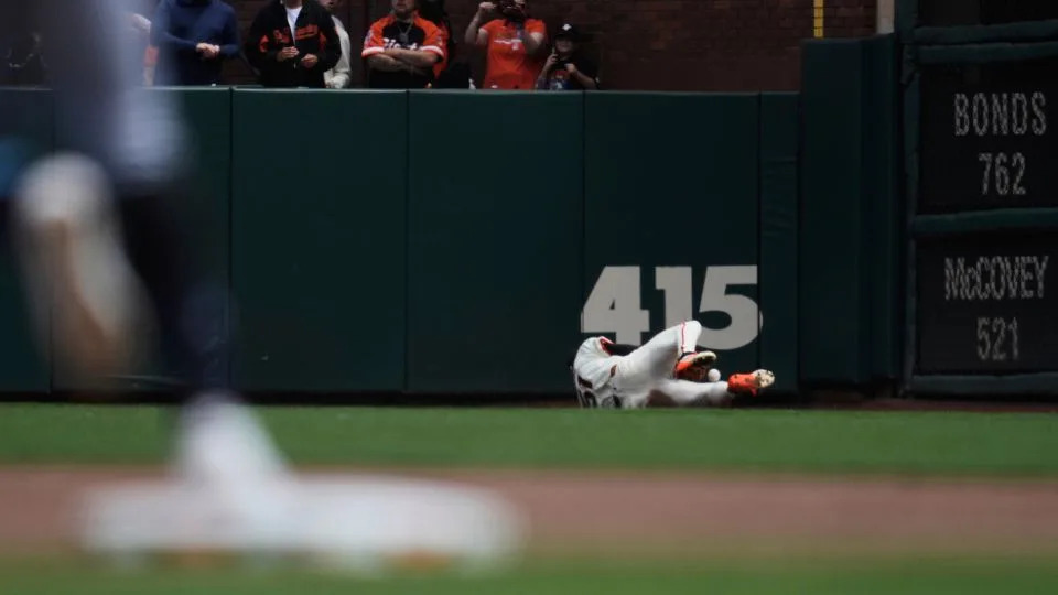 Jung makes the catch in the fourth inning. - Jeff Chiu/AP