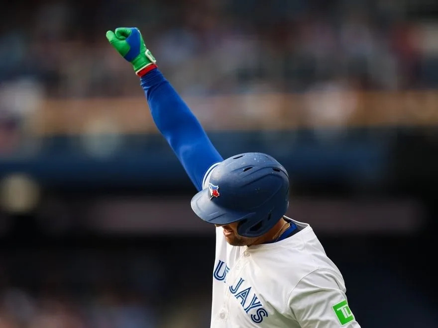 George Springer #4 of the Toronto Blue Jays reacts after beating a throw to single in the fifth inning of their MLB game against the Texas Rangers at Rogers Centre on August 16, 2025 in Toronto.