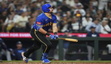 Seattle Mariners' Cal Raleigh watches his three-run home run against the Tampa Bay Rays during the eighth inning of a baseball game Friday, Aug. 8, 2025, in Seattle. (AP Photo/Lindsey Wasson)