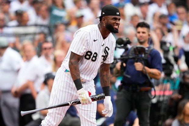 White Sox Luis Robert Jr., reacts during the first round...
