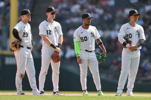 White Sox infielders, from left, Curtis Mead, Colson Montgomery, Lenyn Sosa and Miguel Vargas look on during the ninth inning against the Tigers on Aug. 13, 2025, at Rate Field. (Michael Reaves/Getty Images)
