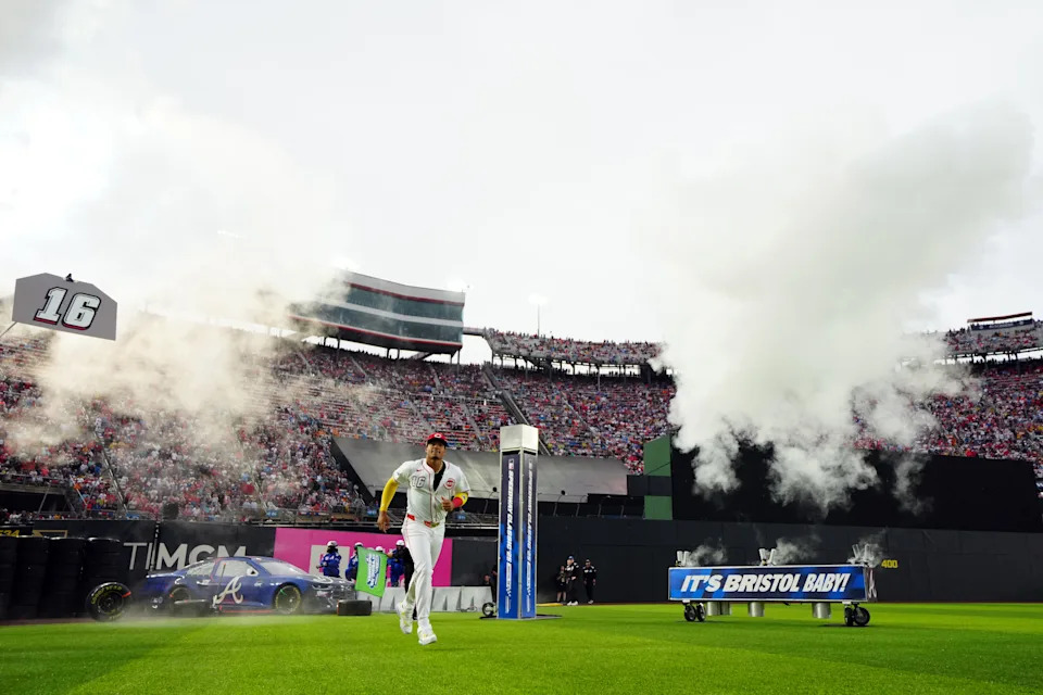 BRISTOL, TN - AUGUST 02:  Noelvi Marte #16 of the Cincinnati Reds takes the field during the pre-game ceremony prior to the 2025 MLB Speedway Classic presented by BulidSubmarines.com between the Atlanta Braves and the Cincinnati Reds at Bristol Motor Speedway on Saturday, August 2, 2025 in Bristol, Tennessee. (Photo by Daniel Shirey/MLB Photos via Getty Images)