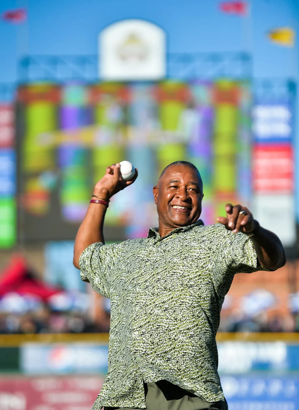 St. Louis Cardinals Hall of Famer Ozzie Smith throws out the first pitch during a Peoria Chiefs game with Clinton at Dozer Park in 2014.
