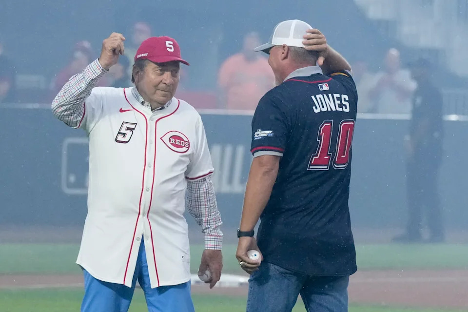 Cincinnati Reds legend Johnny Bench, and Atlanta Braves legend Chipper Jones prepared to throw out the ceremonial first pitch before the MLB Speedway Classic baseball game between the Atlanta Braves and the Cincinnati Reds at Bristol Motor Speedway in Bristol, Tenn., Saturday, Aug. 2, 2025. (AP Photo/Chris Carlson)