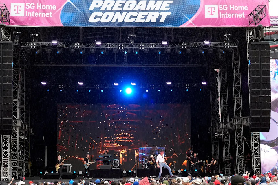 Tim McGraw performs prior to the MLB Speedway Classic between the Atlanta Braves and the Cincinnati Reds at Bristol Motor Speedway.