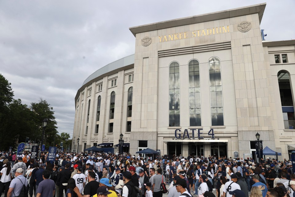 Fans lined up outside Yankee Stadium Gate 4 for a bobblehead giveaway.