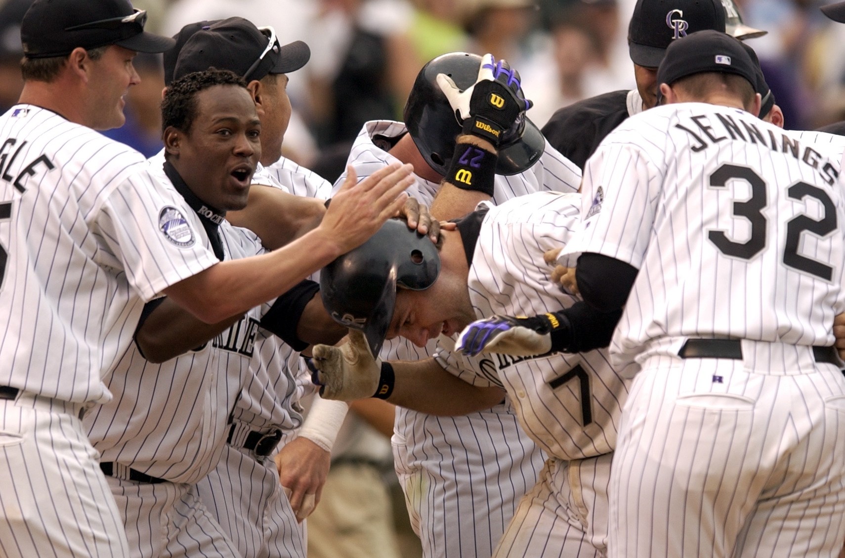 Colorado Rockies players celebrate a game winning 3 run homerun of Todd Zeile at the home plate at Coors Field against New York Yankees. Colorado won 14-11. (Photo By Hyoung Chang/The Denver Post via Getty Images)