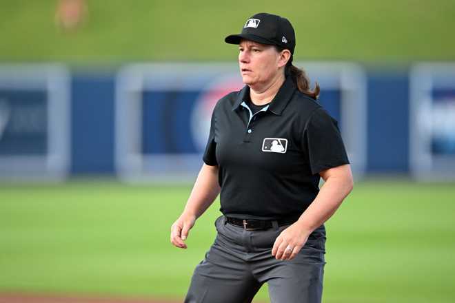WEST PALM BEACH, FLORIDA - MARCH 20, 2024: First base umpire Jen Pawol looks on during the first inning of a spring training game between the St. Louis Cardinals and the Washington Nationals at CACTI Park of the Palm Beaches on March 20, 2024 in West Palm Beach, Florida. (Photo by Nick Cammett/Diamond Images via Getty Images)