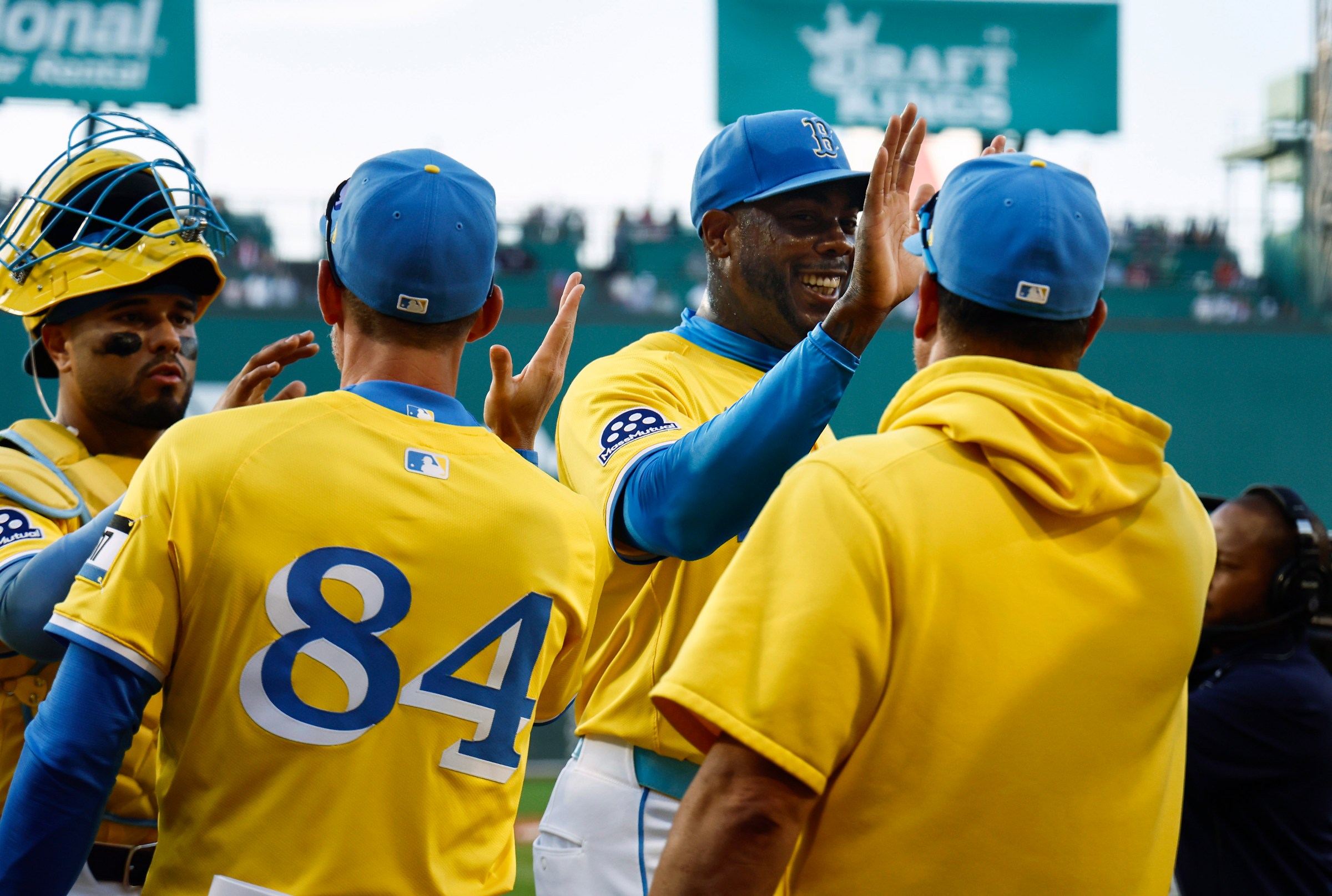 BOSTON, MA - AUGUST 2: Reliever Aroldis Chapman #44 of the Boston Red Sox smiles as he is congratulated by teammates after getting the save in their 7-3 win over the Houston Astros at Fenway Park on August 2, 2025 in Boston, Massachusetts. (Photo By Winslow Townson/Getty Images)
