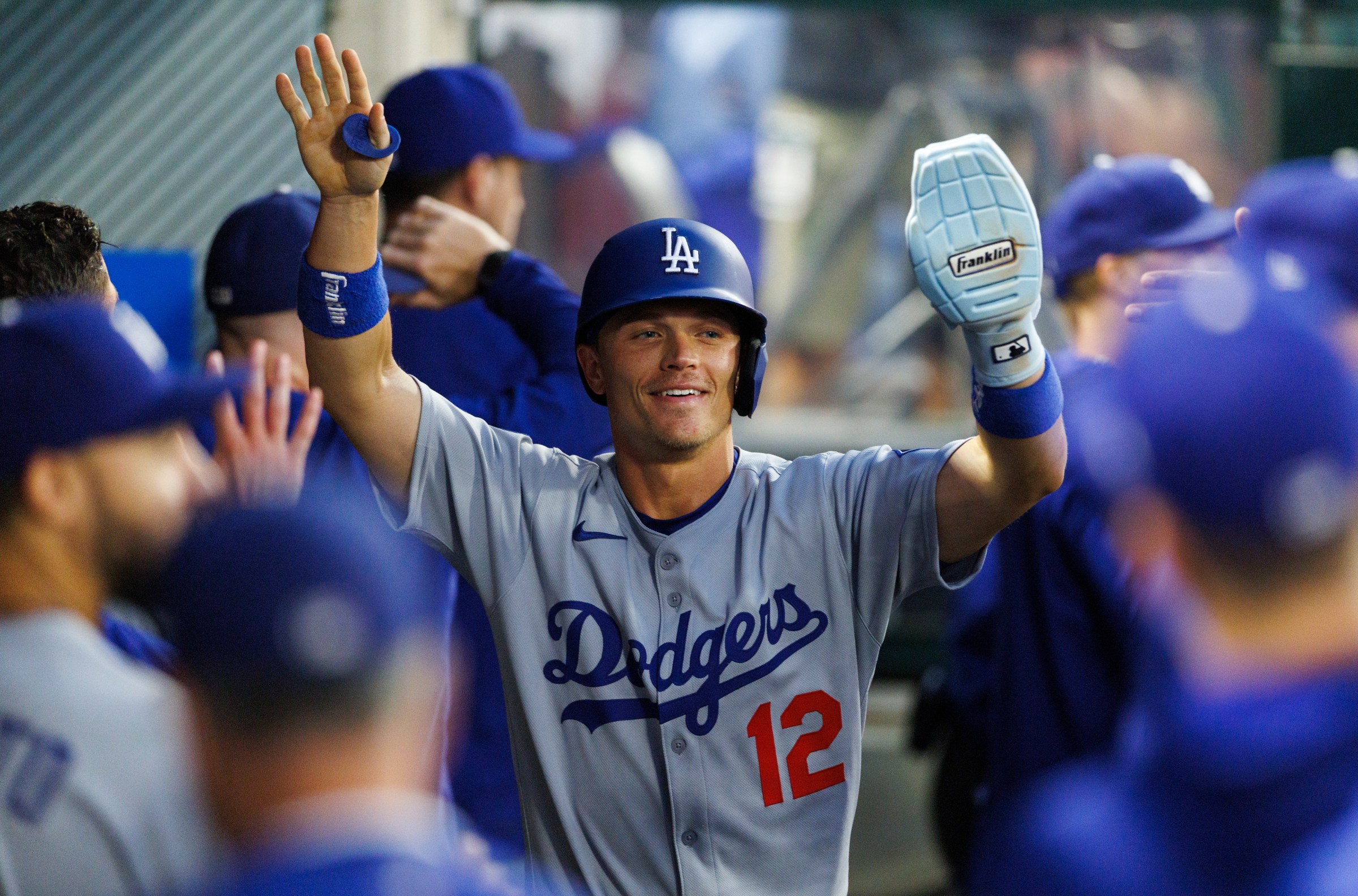 ANAHEIM, CALIFORNIA - AUGUST 13: Alex Call #12 of the Los Angeles Dodgers celebrates during the game against the Los Angeles Angels at Angel Stadium of Anaheim on August 13, 2025 in Anaheim, California. (Photo by Ric Tapia/Getty Images)