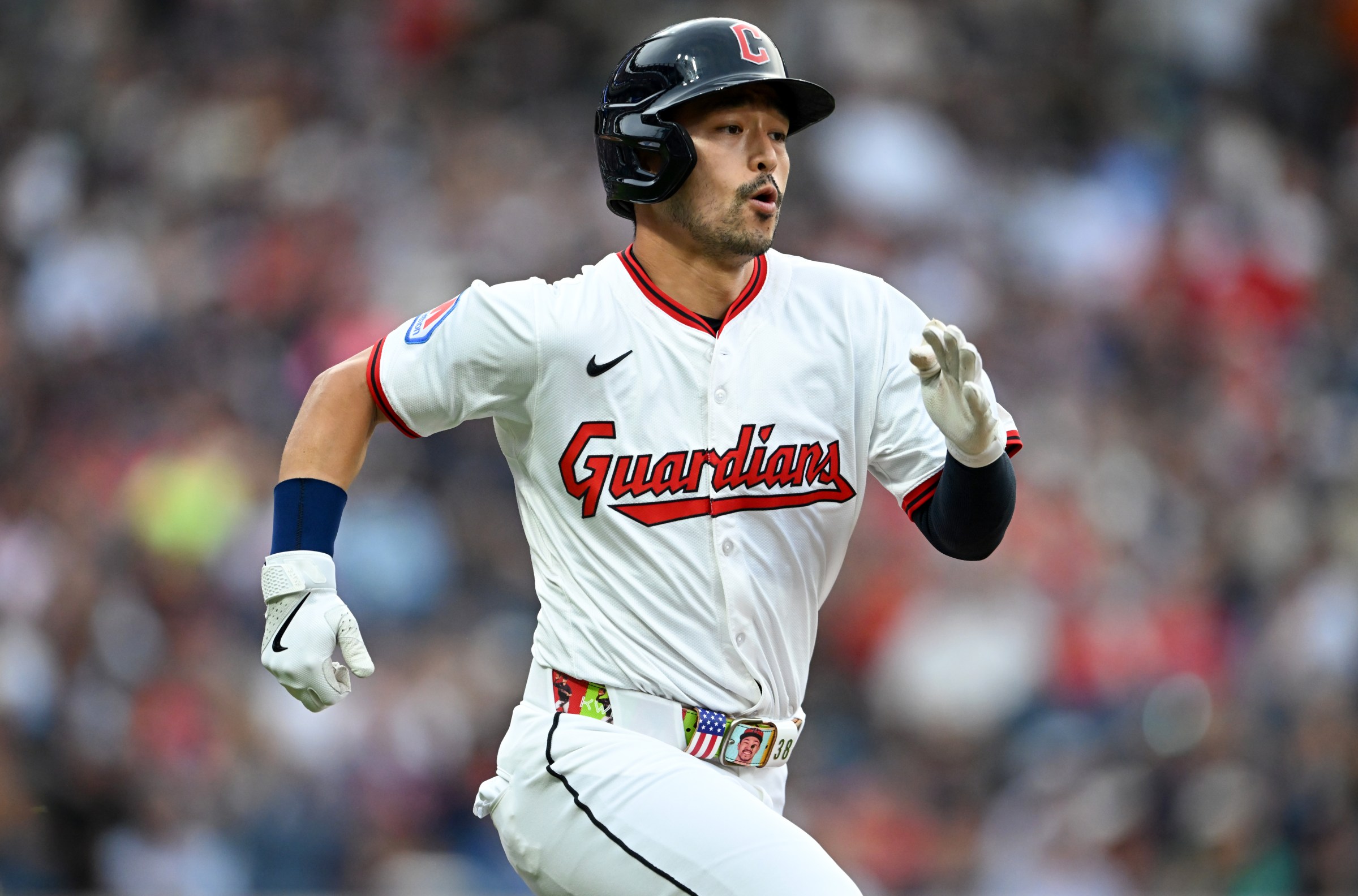 CLEVELAND, OHIO - AUGUST 16: Steven Kwan #38 of the Cleveland Guardians runs out an infield single during the first inning against the Atlanta Braves at Progressive Field on August 16, 2025 in Cleveland, Ohio. (Photo by Nick Cammett/Getty Images)