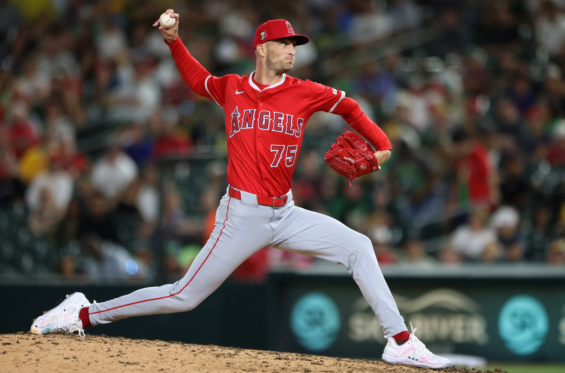 SACRAMENTO, CALIFORNIA - AUGUST 15: Connor Brogdon #75 of the Los Angeles Angels pitches against the Athletics during the bottom of the fifth inning at Sutter Health Park on August 15, 2025 in Sacramento, California. (Photo by Scott Marshall/Getty Images)