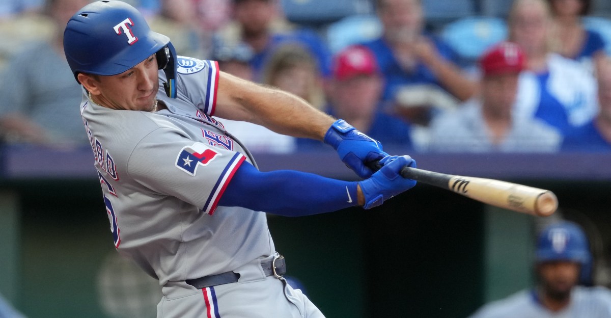Ninth inning outburst helps Texas Rangers overcome Kansas City Royals