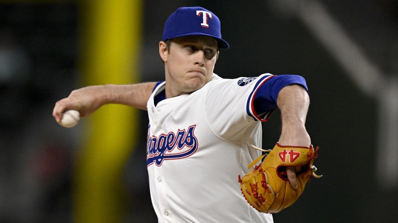 Aug 11, 2025; Arlington, Texas, USA; Texas Rangers relief pitcher Phil Maton (88) pitches against the Arizona Diamondbacks during the tenth inning at Globe Life Field / Jerome Miron-Imagn Images