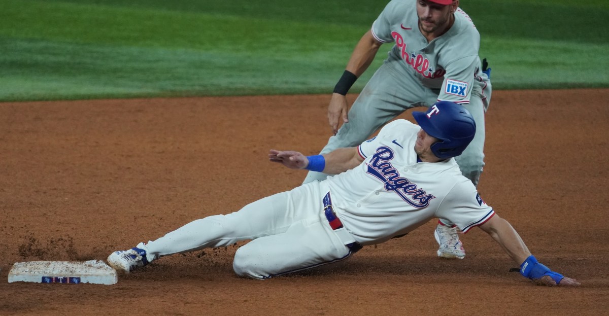 Philadelphia Phillies cash in, Rangers squander during loss