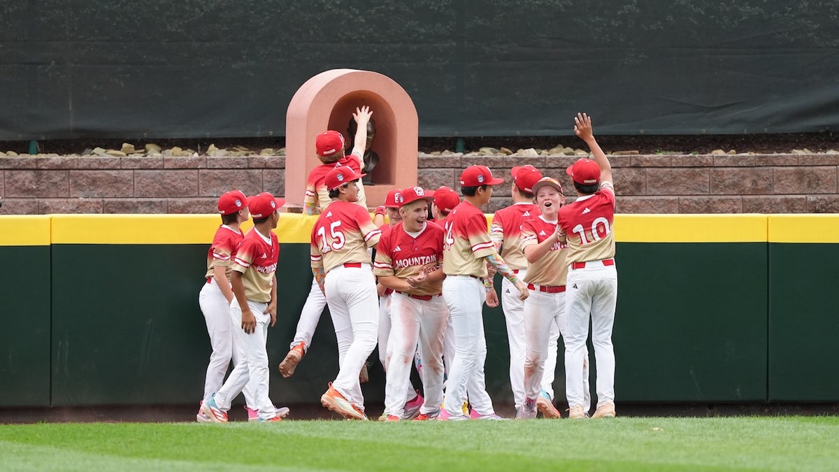 Mountain Region celebrate after the game against Metro Region at Howard J. Lamade Stadium.
